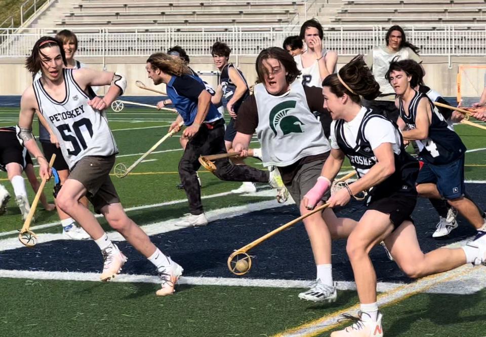Petoskey lacrosse players learn to play the Native American traditional style of lacrosse, which turned out a bit more challenging for some.