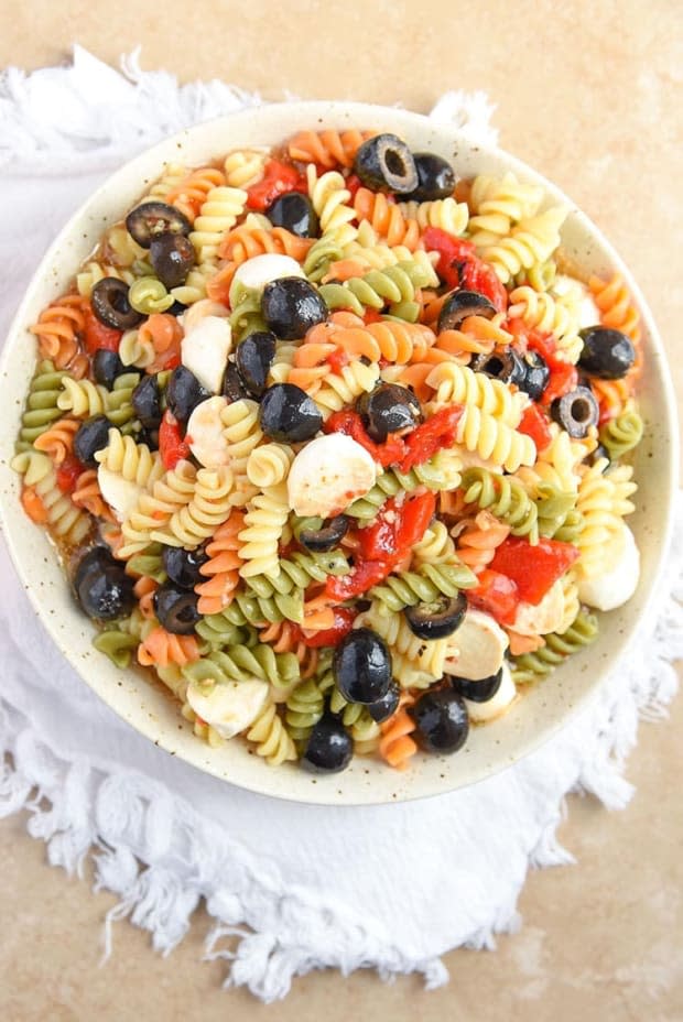 <p>This recipe is easy enough that you can recruit one of the older kids to help prepare it. </p><p><strong>Get the recipe: <a href="https://www.courtneyssweets.com/tri-colored-pasta-salad-recipe/" rel="nofollow noopener" target="_blank" data-ylk="slk:Tri Colored Pasta Salad;elm:context_link;itc:0;sec:content-canvas" class="link ">Tri Colored Pasta Salad</a></strong></p><p>Courtney's Sweets</p>