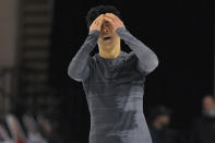 Nathan Chen reacts after performing during the men's short program at the Skate America figure skating event Friday, Oct. 22, 2021, in Las Vegas. (AP Photo/David Becker)