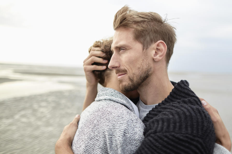 Couple embracing (Getty Images)