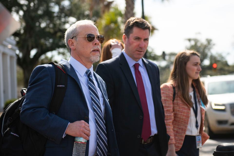 Creighton Waters, prosecutor for the State of South Carolina, evacuates the Colleton County Courthouse after a bomb threat was called into the courthouse during Alex Murdaugh's double murder trial in Walterboro, S.C., on Wednesday, Feb. 8, 2023.