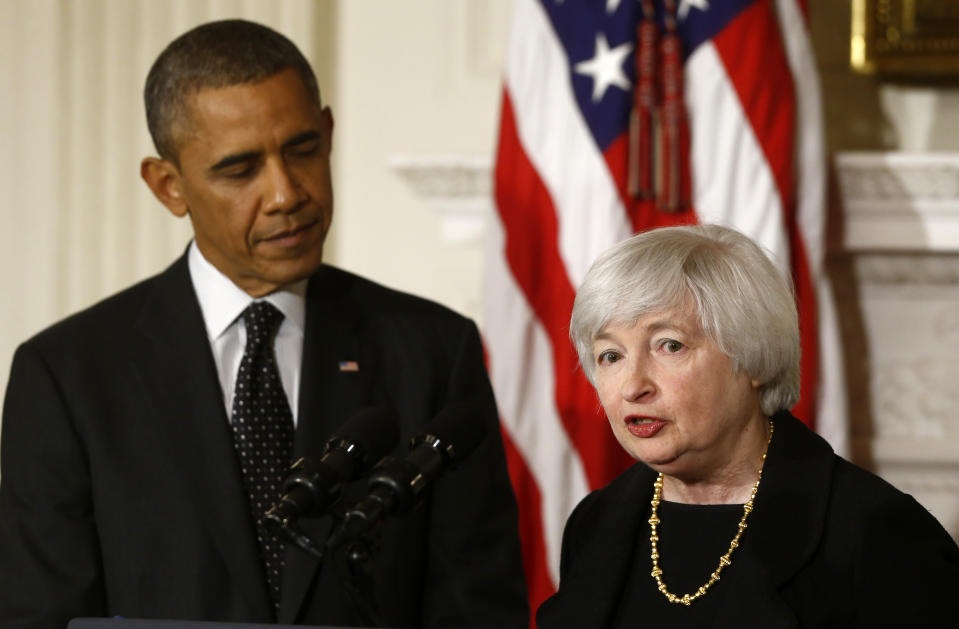 FILE - In this Oct. 9, 2013, file photo President Barack Obama listens as Janet Yellen, vice chair of the Board of Governors of the Federal Reserve System, speaks in the State Dining Room of the White House in Washington, where the president announced he is nominating Yellen to be chair of the Federal Reserve, succeeding Ben Bernanke. (AP Photo/Charles Dharapak, File)