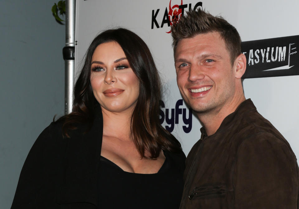 Lauren Kitt (L) and Singer Nick Carter (R) attend the premiere of Syfy's "Dead 7" at Harmony Gold on April 1, 2016 in Los Angeles, California.  (Photo by Paul Archuleta/FilmMagic)