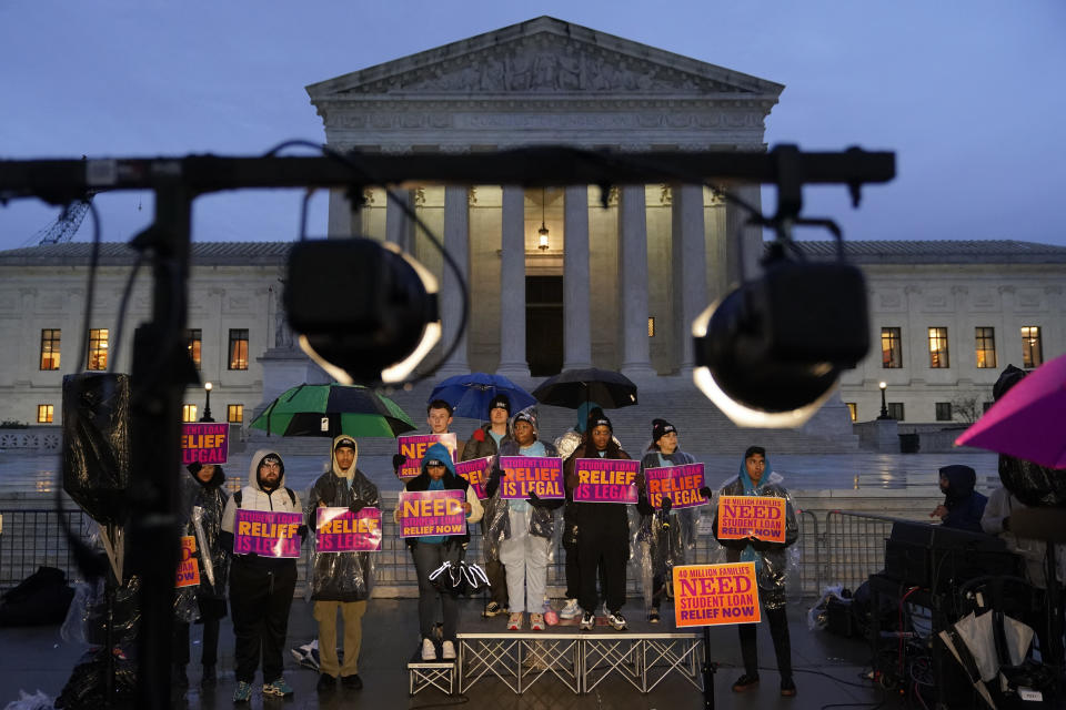 Student debt relief advocates gather outside the Supreme Court on Capitol Hill in Washington, Monday, Feb. 27, 2023. Arguments at the Supreme Court over President Joe Biden's student debt cancellation left some borrowers feeling isolated as they heard such a personal subject reduced to cold legal language. (AP Photo/Patrick Semansky)