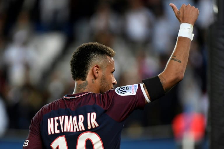 Paris Saint-Germain's forward Neymar scored twice in his home debut at the Parc des Princes stadium in Paris on August 20, 2017