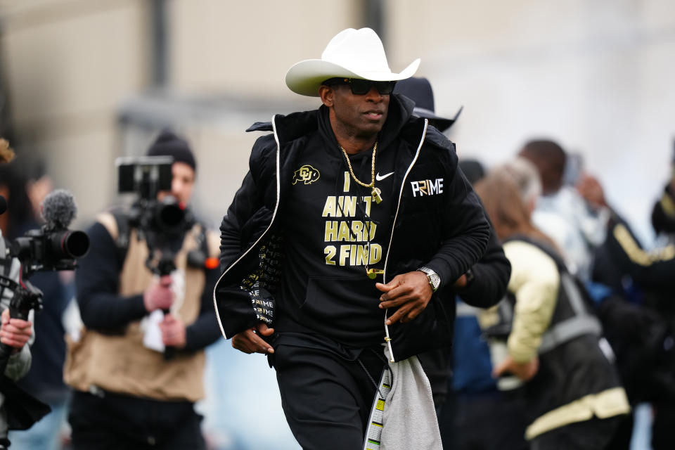 Colorado coach Deion Sanders hits the field before the start of the spring game at Folsom Field. (Ron Chenoy-USA TODAY Sports)