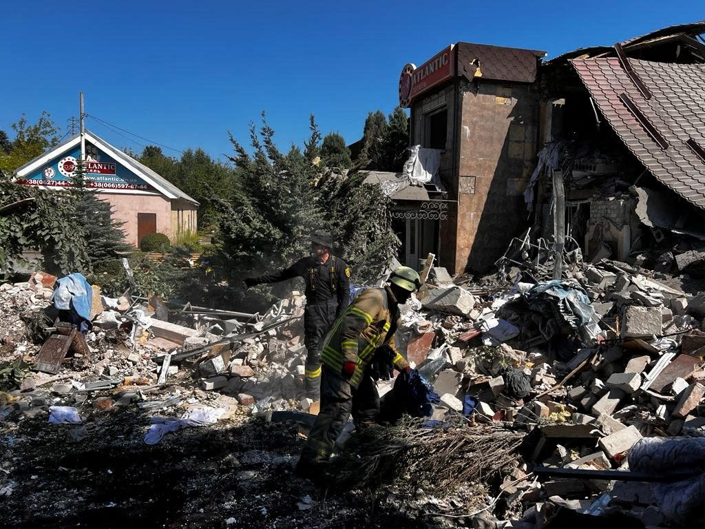 Rescuers remove debris of a hotel destroyed by a Russian military strike, as Russia's attack on Ukraine continues, in the town of Bakhmut, Donetsk region, Ukraine July 27, 2022. Press service of the State Emergency Service of Ukraine/Handout via REUTERS ATTENTION EDITORS - THIS IMAGE HAS BEEN SUPPLIED BY A THIRD PARTY.