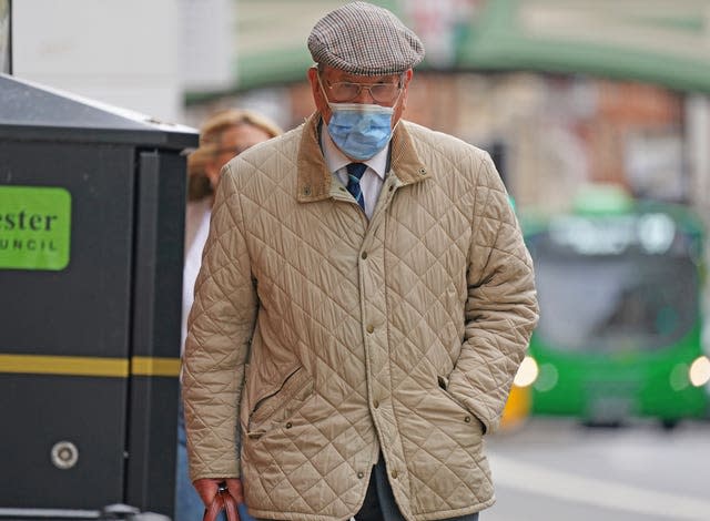 David Venables wearing jacket, hat and mask