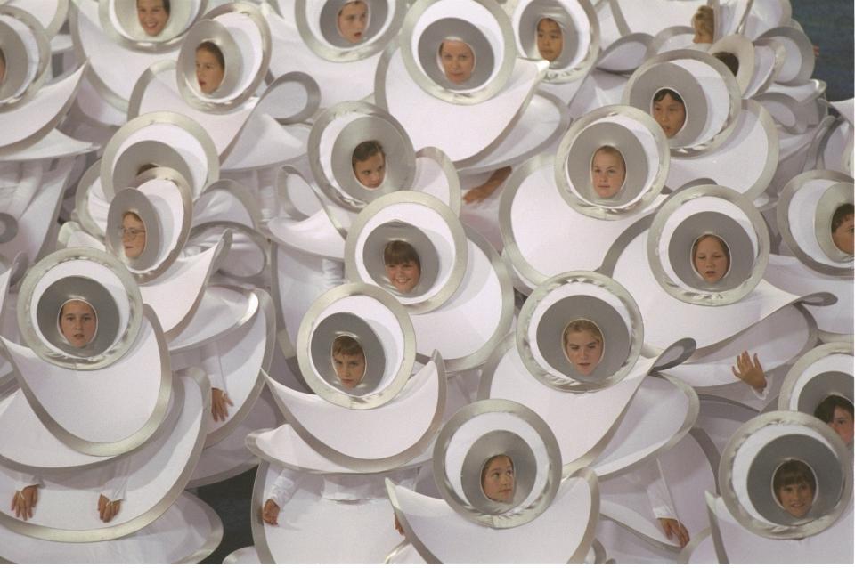 Children in costumes representing the Olympic Rings during the Opening Ceremony of the 1996 Olympic Games in Atlanta, Georgia.