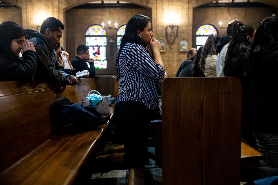 Jessica Maciel Hernandez, 27, the coordinator of hispanic youth ministry for the Diocese of Des Moines, attends mass given in Spanish at St. Anthony Catholic Church, Feb. 17, 2019.
