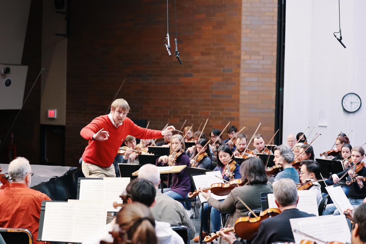 Matthew Jenkins Jaroszewicz leads the Canton Symphony Orchestra during a rehearsal for a recent MasterWorks concert featuring renowned pianist Garrick Ohlsson.