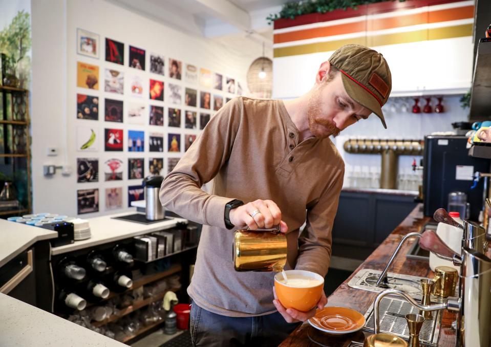 Jacob Nuttbrock pours a latte at Offbeat Coffee on Jan. 19 in Salem.