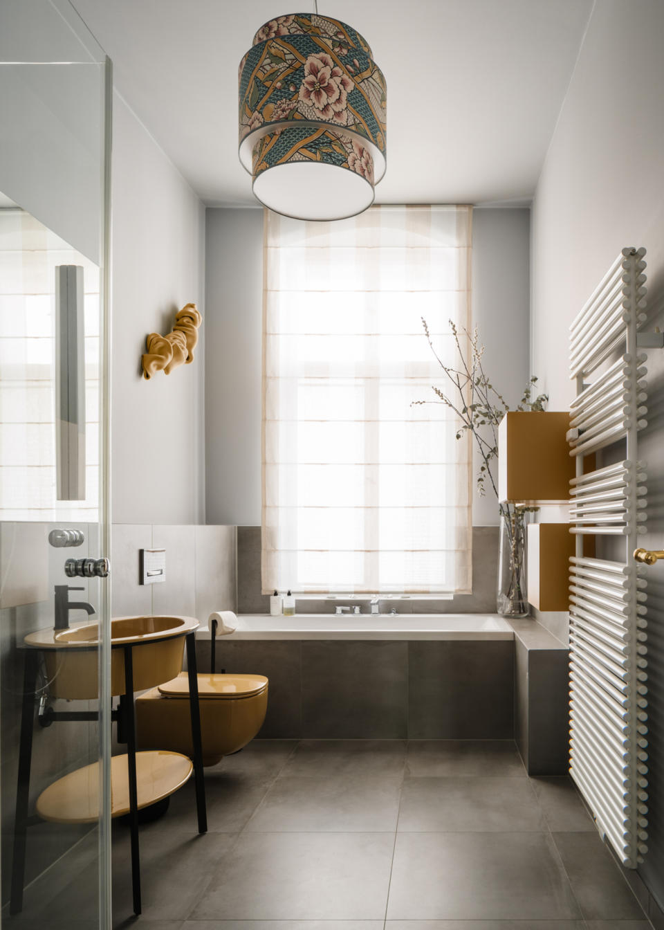 A bathroom with overhead lighting