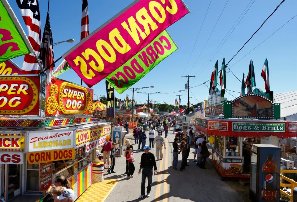 A line of food vendors at the Florida Strawberry Festival.