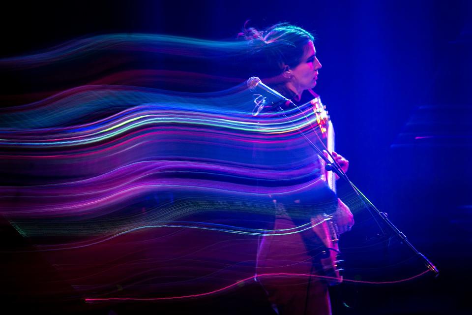 This image taken with a slow shutter speed shows Claire Glass performing with Black Belt Eagle Scout during Mission Creek Festival, Thursday, April 6, 2023, at Hancher Auditorium in Iowa City, Iowa.