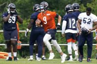 Chicago Bears quarterback Nick Foles (9) runs on the field during NFL football practice in Lake Forest, Ill., Wednesday, July 28, 2021. (AP Photo/Nam Y. Huh)