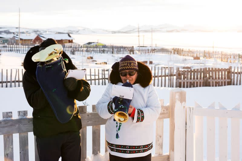 The Wider Image: Climate change means the Inuit do what they've always done: Adapt