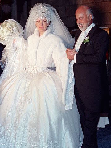 Ryan Remiorz/The Canadian Press/AP Celine Dion and husband Rene Angelil leave their wedding ceremony on December 17, 1994.