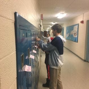 One year of their 25 Days of Christmas Kindness Project, Krista Butts' sons placed around 400 handwritten notes of encouragement and kindness on the lockers of their middle school.