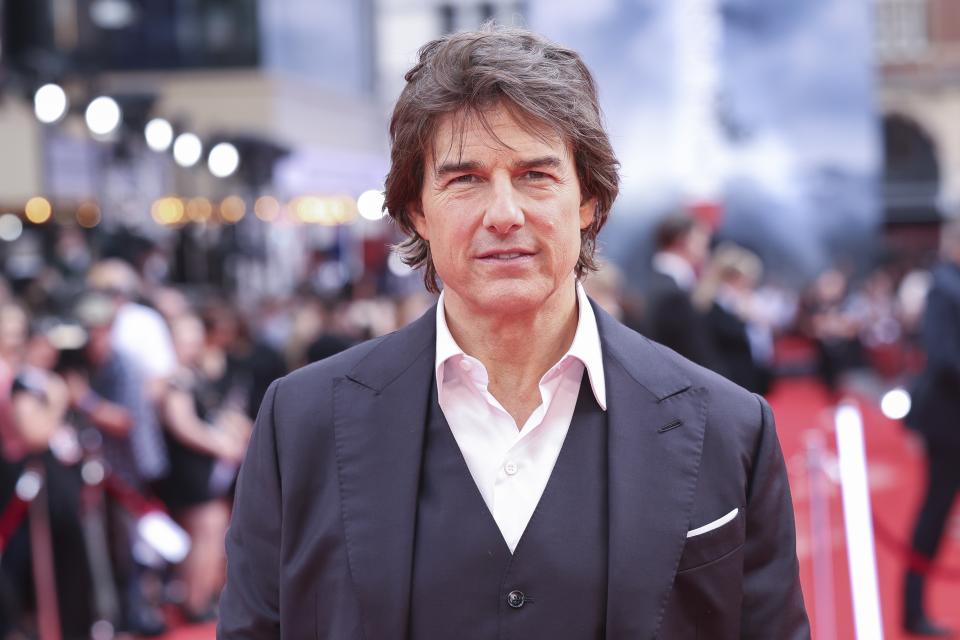 Tom Cruise poses for photographers upon arrival at the premiere of the film 'Mission: Impossible - Dead Reckoning Part One' on Thursday, June 22, 2023 in London. (Vianney Le Caer/Invision/AP)