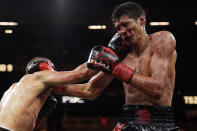 Tim Tszyu, of Australia, hits Sebastian Fundora in a super welterweight title bout Saturday, March 30, 2024, in Las Vegas. (AP Photo/John Locher)