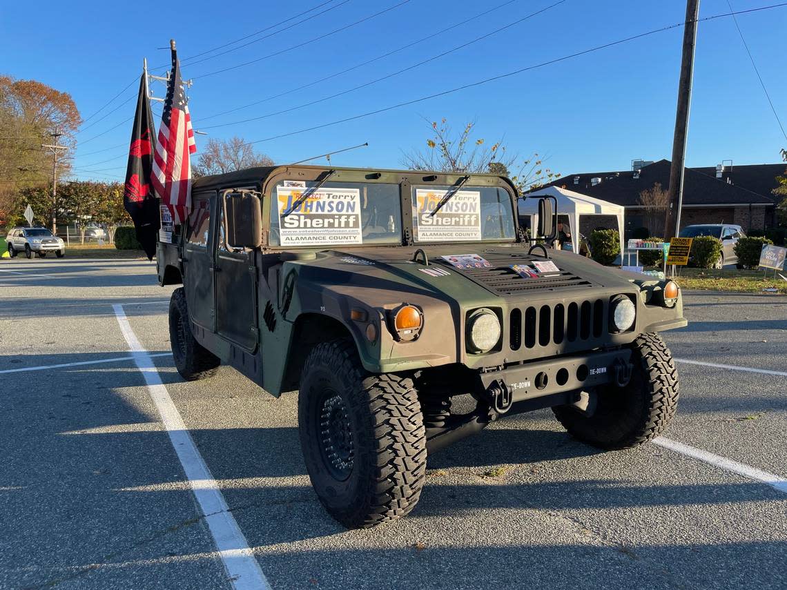 A military-style Humvee with campaign signs was parked outside a polling place in Alamance County Tuesday morning, Nov. 8, 2022. The owner did not want to be photographed.