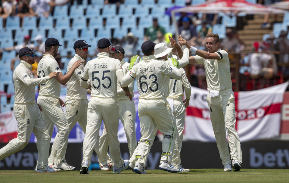 England's bowler Stuart Broad, far right, celebrates with teammate after dismissing South Africa's captain Faf du Plessis for 29 runs on day one of the first cricket test match between South Africa and England at Centurion Park, Pretoria, South Africa, Thursday, Dec. 26, 2019. (AP Photo/Themba Hadebe)