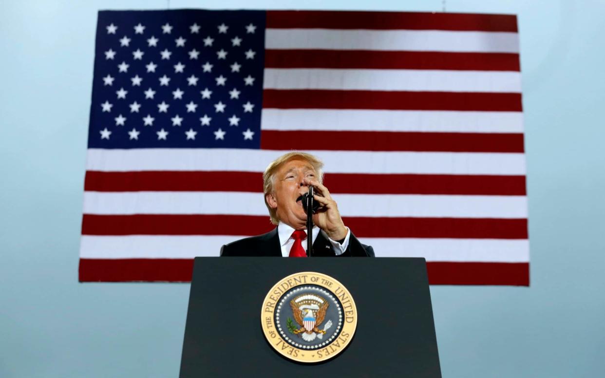 President Donald Trump speaks about tax reform during an event at the Harrisburg International Airport, Wednesday Oct. 11, 2017 - AP