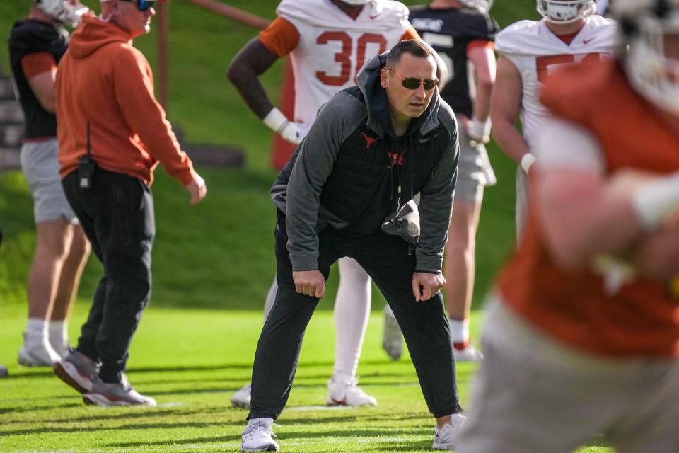 Texas football coach Steve Sarkisian eyes the action during a spring practice at Frank Denius Fields in March. While Sarkisian said he likes the construction of his roster, he said the team will explore its options in the two-week spring portal window, which opened Monday.