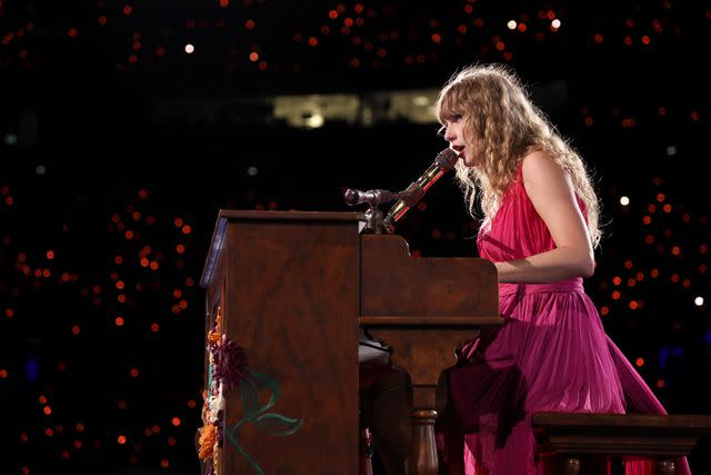 <p>Getty Images</p> Taylor Swift playing a different piano onstage in France in June 2024