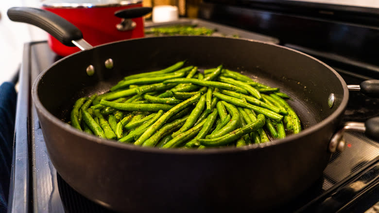 green beans being sauteed 