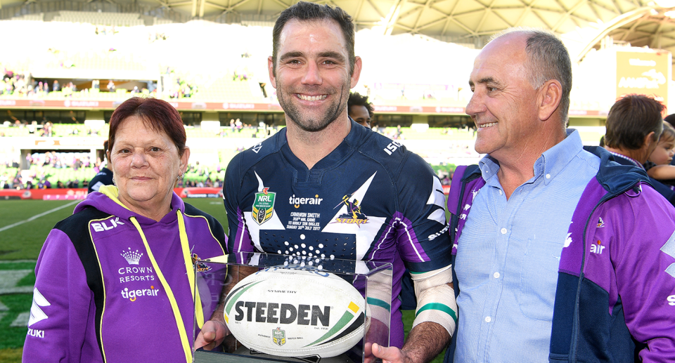 Cameron Smith is seen here alongside his parents Sonia and Wayne in 2017 after playing his 350th NRL game for the Melbourne Storm. Pic: Getty