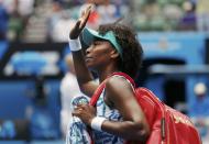 Venus Williams of the U.S. waves to the crowd as she walks off the court after being defeated by compatriot Madison Keys in their women's singles quarter-final match at the Australian Open 2015 tennis tournament in Melbourne January 28, 2015. REUTERS/Athit Perawongmetha (AUSTRALIA - Tags: SPORT TENNIS)