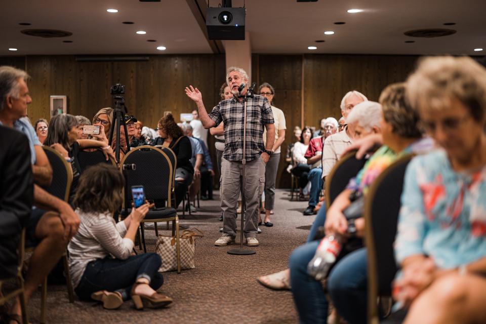 Attendees ask questions during Dr. Peter McCullough's presentation at the Bartlesville Community Center Tuesday, Oct. 6.