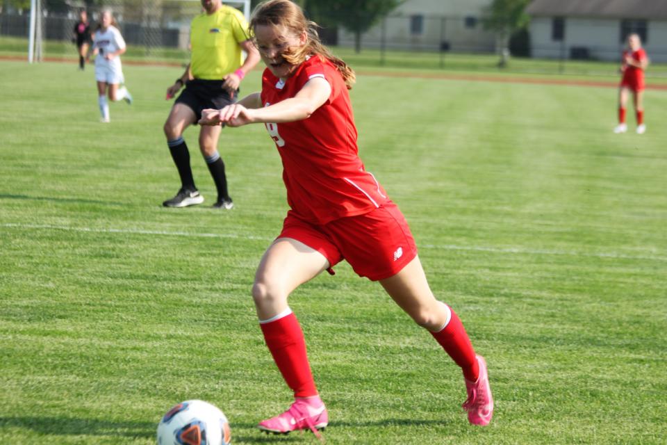 Chatham Glenwood senior midfielder Ella Gorrie lines up for a shot during a Central State Eight Conference match against Rochester at the Glenwood Athletic Complex on Tuesday, May 10.