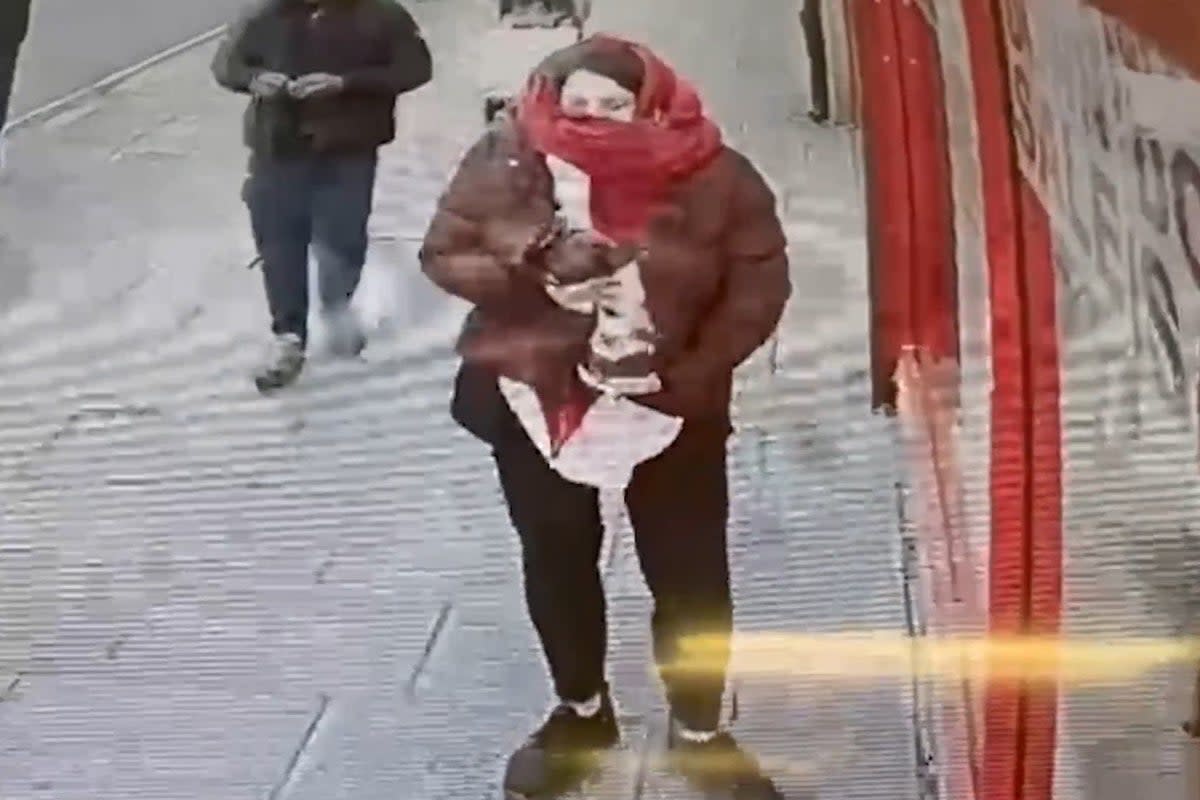 CCTV footage of Constance Marten holding baby Victoria in East Ham, London  (PA)