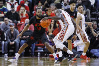 San Diego State's KJ Feagin (10) defends against UNLV's Amauri Hardy (3) during the second half of an NCAA college basketball game on Sunday, Jan. 26, 2020, in Las Vegas. (AP Photo/Joe Buglewicz)