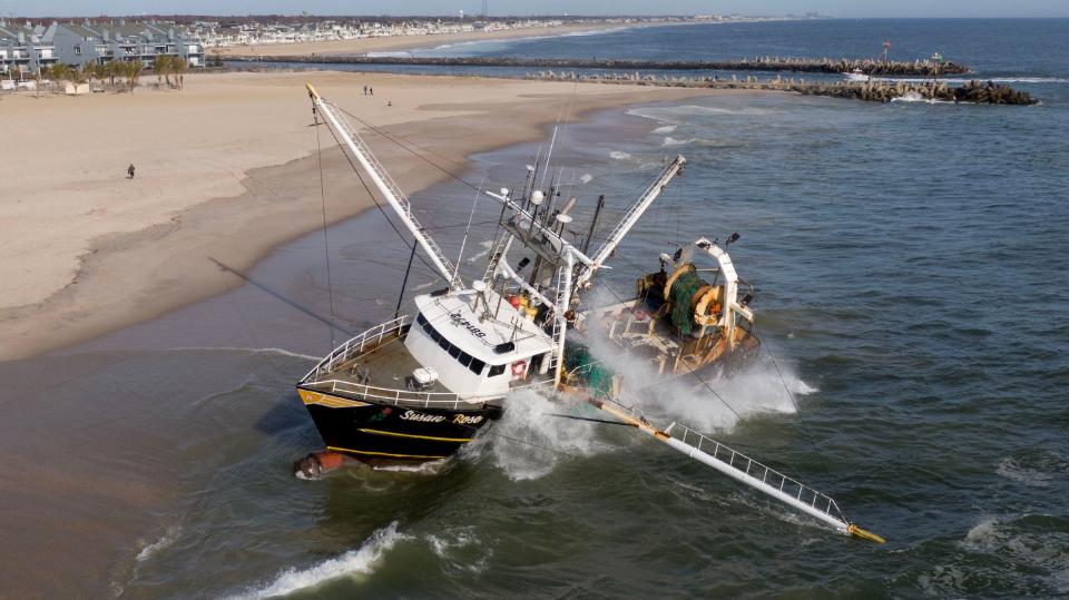 The Susan Rose gets battered by waves after it beached in Point Pleasant Beach just south of the Manasquan Inlet Friday morning, November 17, 2023.