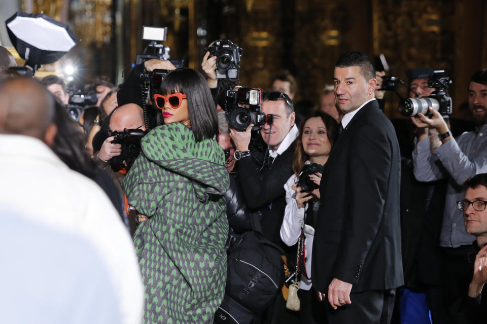 Singer Rihanna arrives at Stella McCartney's ready-to-wear fall/winter 2014-2015 fashion collection presented in Paris, Monday, March 3, 2014. (AP Photo/Jacques Brinon)