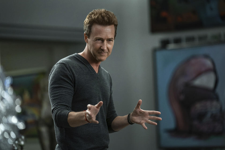 This image released by Netflix shows Edward Norton in a scene from "Glass Onion: A Knives Out Mystery." Norton portrays Miles Bron, an eccentric tech billionaire who brings his wealthy friends to a private island in Greece to take part in a game to solve his murder. (John Wilson/Netflix via AP)