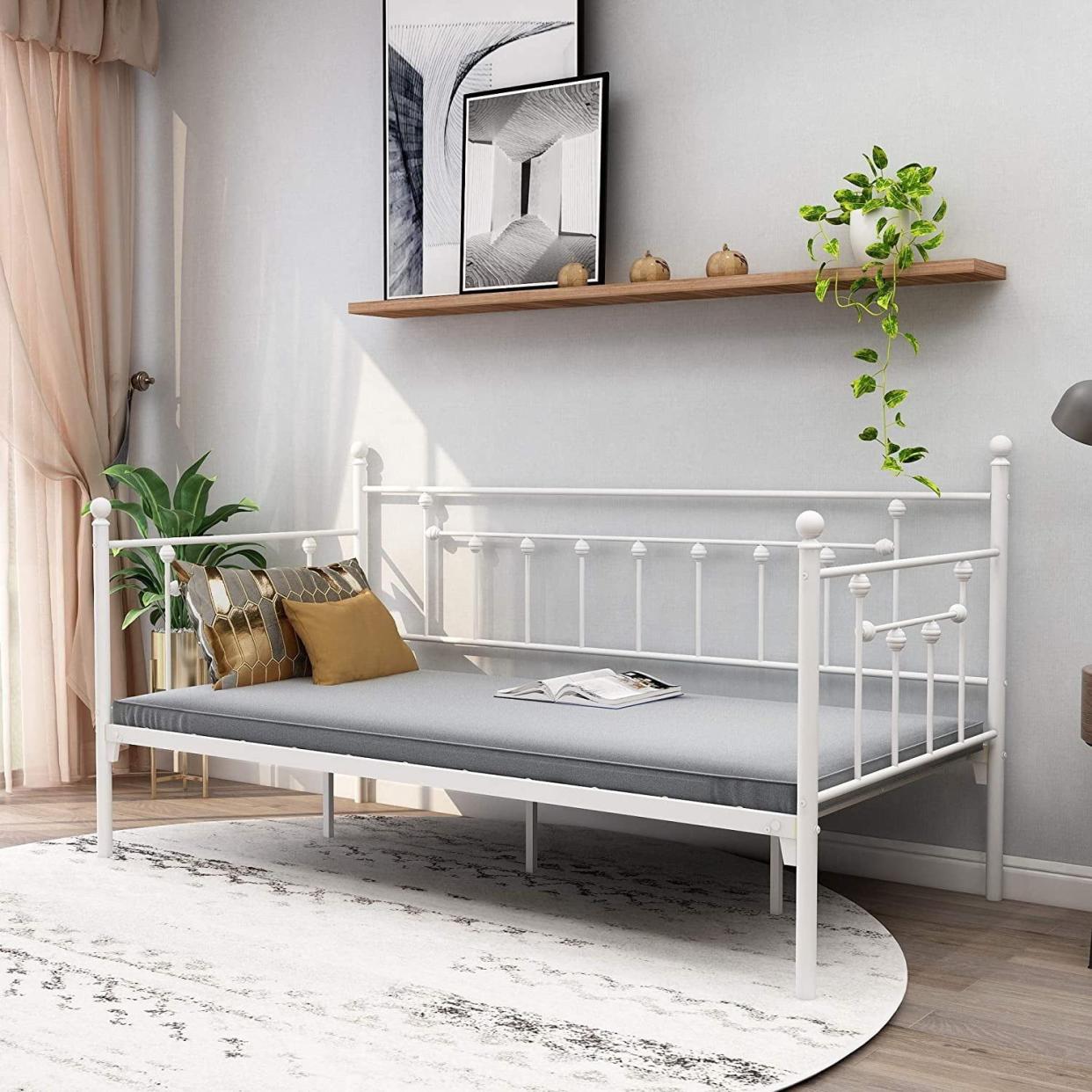 <p><a href="https://go.redirectingat.com?id=74968X1596630&url=https%3A%2F%2Fwww.walmart.com%2Fip%2FAlazyhome-Twin-Daybed-Frame-Metal-Sofa-Platform-Bed-Frame-White%2F633282764&sref=https%3A%2F%2Fwww.housebeautiful.com%2Fdesign-inspiration%2Fa30733969%2Fwhat-is-daybed%2F" rel="nofollow noopener" target="_blank" data-ylk="slk:Shop Now;elm:context_link;itc:0;sec:content-canvas" class="link rapid-noclick-resp">Shop Now</a></p><p>Metal Frame Daybed</p><p>walmart.com</p><p>$152.45</p>