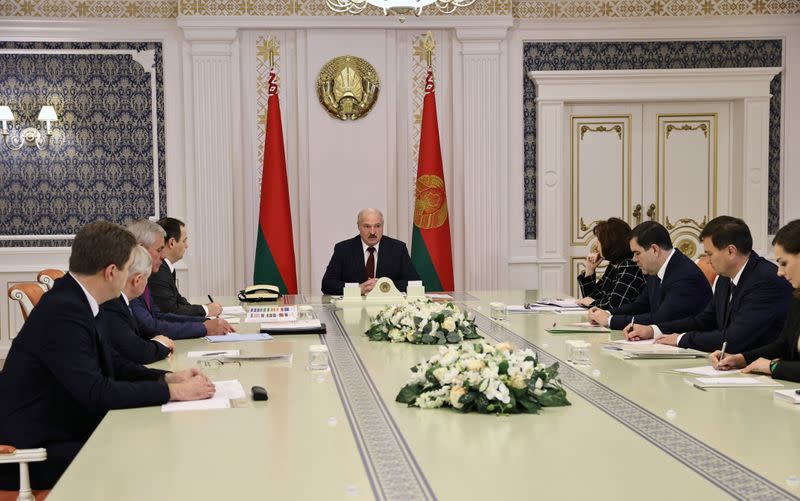 Belarusian President Lukashenko attends a meeting in Minsk