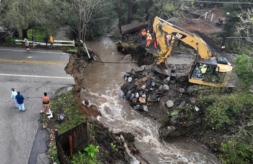 California storm brings flooding, breached levees and evacuations; more