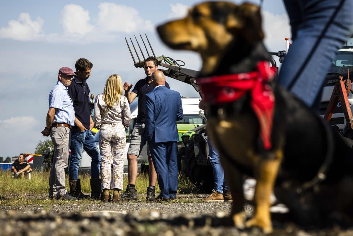 Mayor Kees van Rooij of Meierijstad meets with farmers during a demonstration against the Dutch government’s far-reaching plans to cut nitrogen emissions in Veghel (ANP/AFP via Getty)