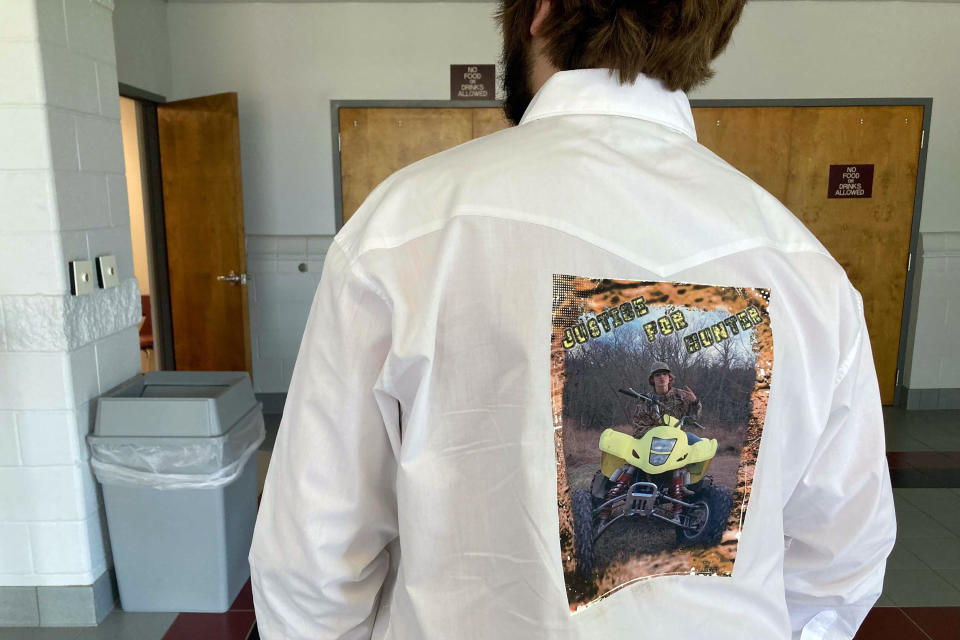 Andrew Mone wears a shirt featuring Hunter Brittain before a memorial service in Beebe, Ark., on Tuesday, July 6, 2021. Brittain, 17, was shot and killed by a Lonoke County Sheriff's deputy during a traffic stop on June 23. (AP Photo/Andrew Demillo)