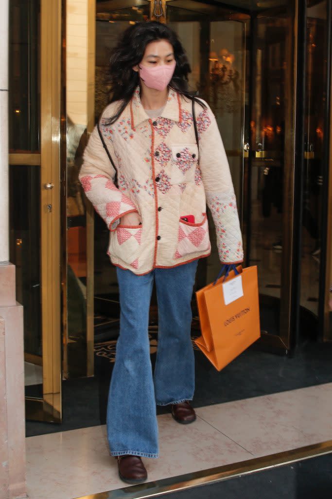 Hoyeon Jung leaves her hotel during Paris Fashion Week on March 6. - Credit: Spread Pictures / MEGA