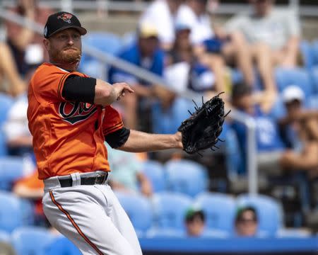 FILE PHOTO: Mar 16, 2019; Dunedin, FL, USA; Baltimore Orioles pitcher Alex Cobb (17) fields a ground ball from Toronto Blue Jays outfielder Jonathan Davis (not pictured) during the fifth inning at Dunedin Stadium. Mandatory Credit: Douglas DeFelice-USA TODAY Sports