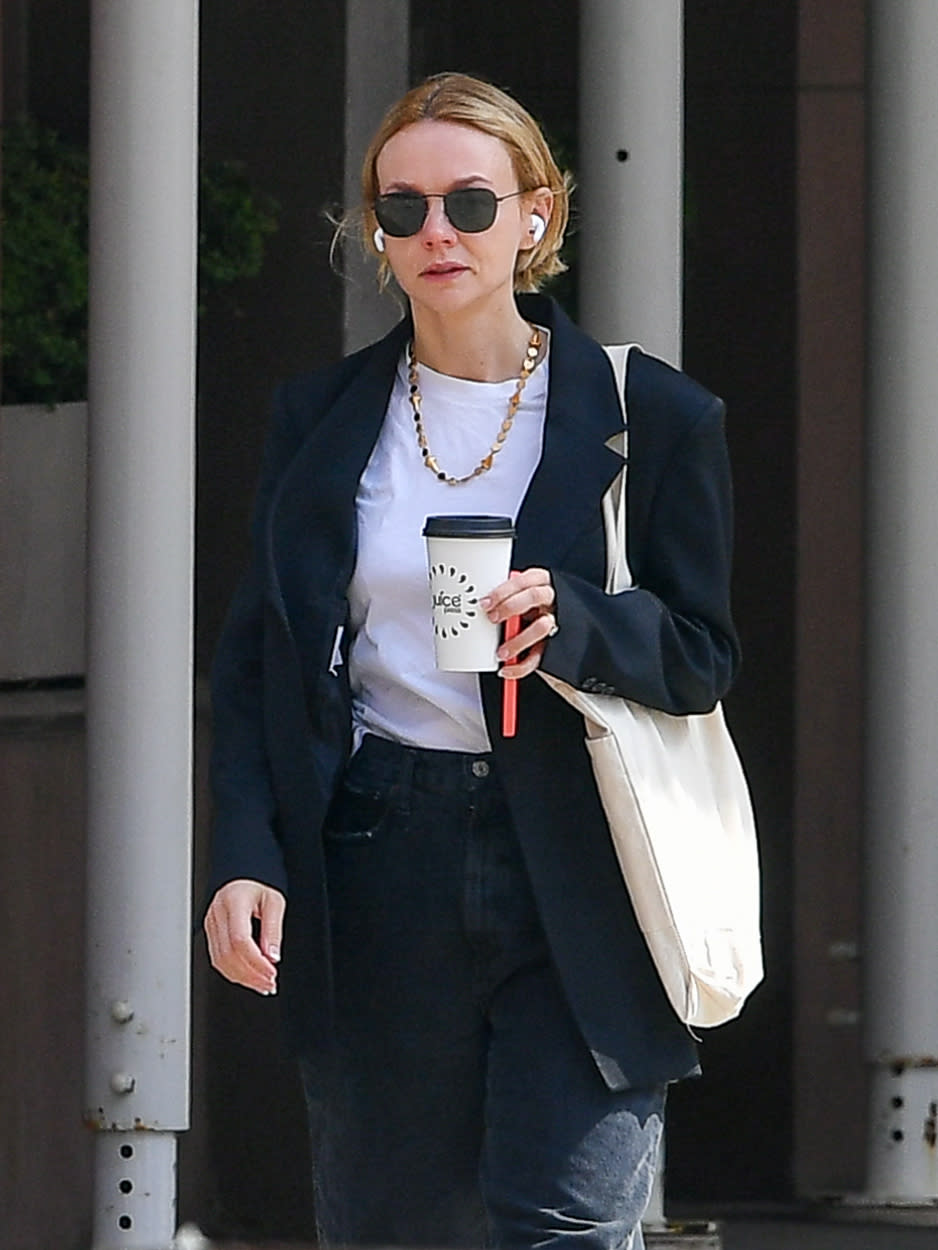 <p>Carey Mulligan takes her coffee to-go in N.Y.C. on May 20.</p>