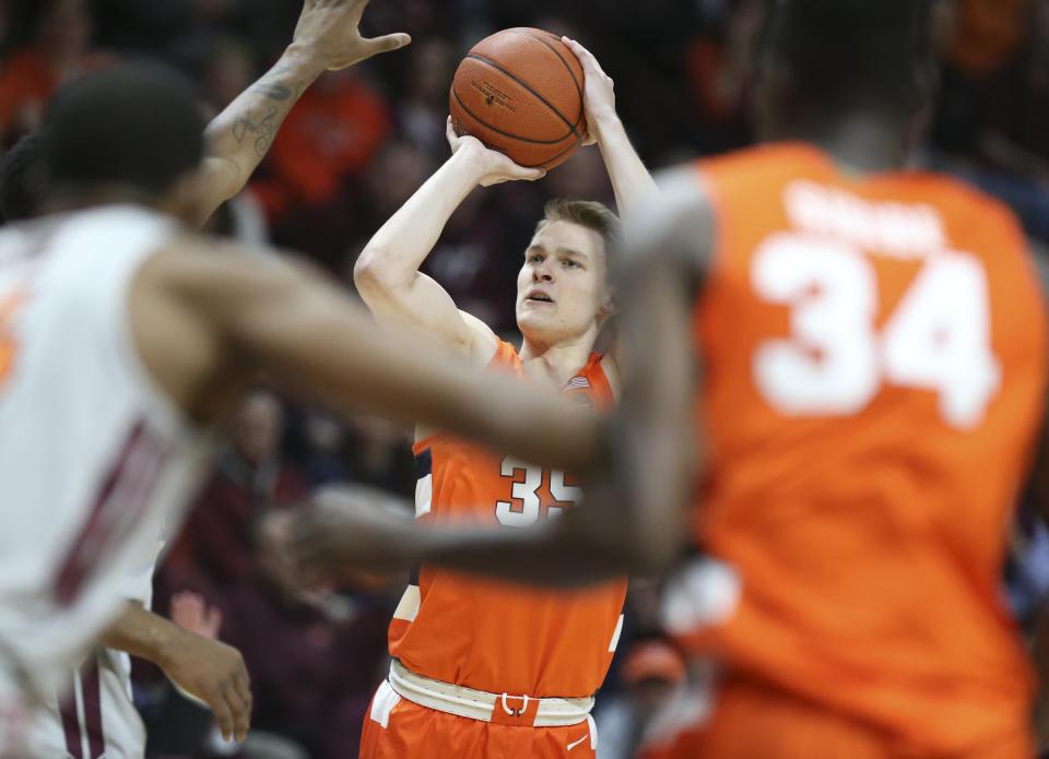 Syracuse's Buddy Boeheim (35) shoots over the Virginia Tech defense during the first half of an NCAA college basketball game in Blacksburg Va., Saturday, Jan. 18 2020. (Matt Gentry/The Roanoke Times via AP)