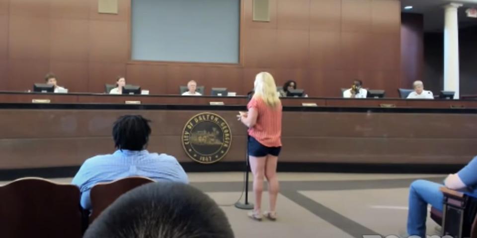 A Zoom screenshot showing Marjorie Taylor Green, viewed from behind, addressing the Dalton City Council meeting June 15 2020.